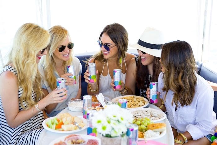 a group of women getting dinner and drinks